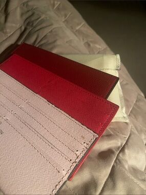 Three new slim,Red, Light Pink burgundy Credit Card Holder.$25ea. One dust cover